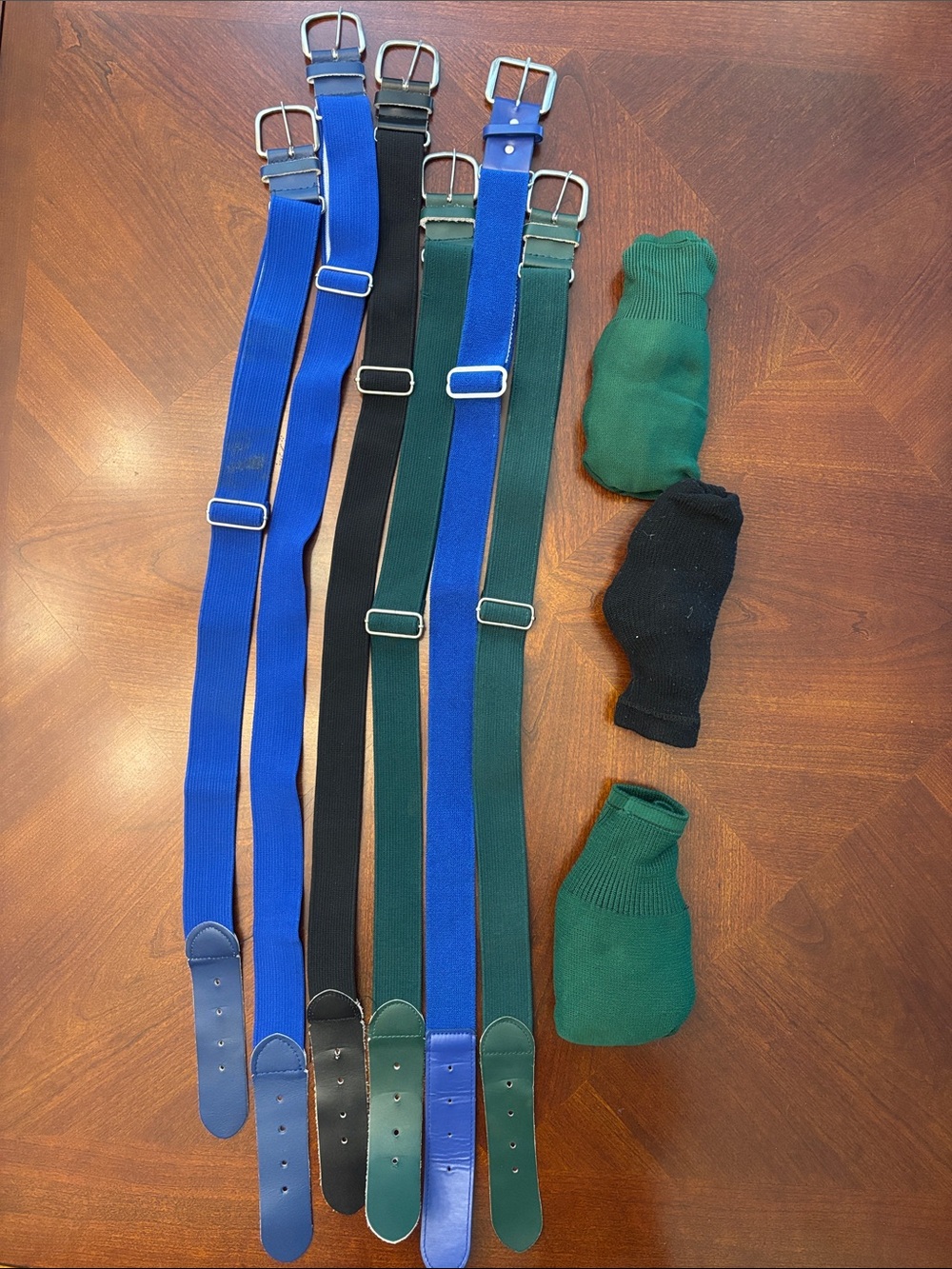 Men's Adjustable Elastic Belts in Blue, Black, and Green. Three pair of baseball